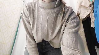 Oung Girl in the Fitting Room of the Store